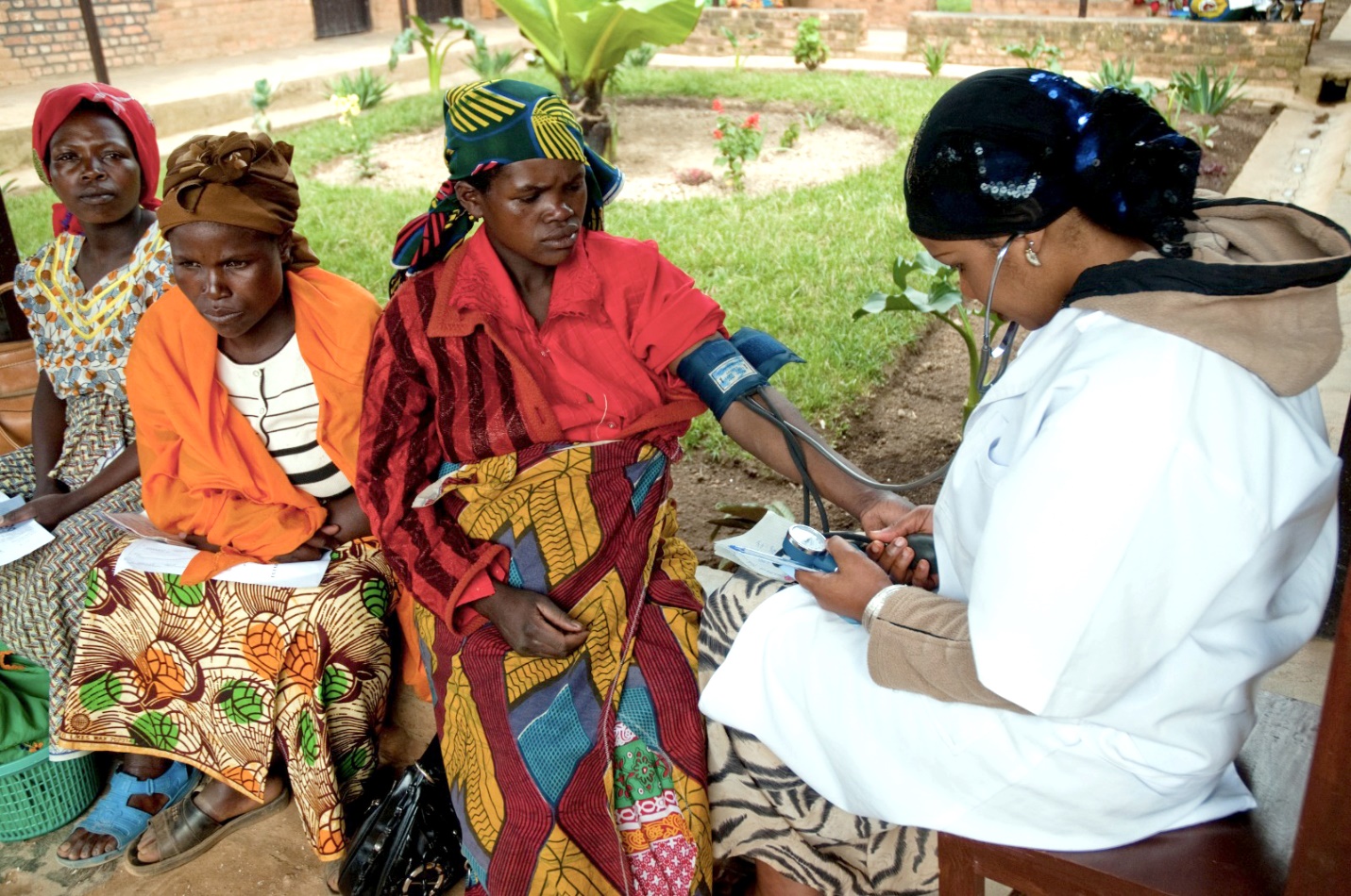 Woman in Rwanda gets her blood pressure checked